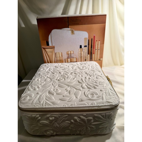 Estée Lauder Handbags - NIB Estee Lauder Re-Nutriv White Embossed Floral Luxury Vanity Case Cosmetic Bag